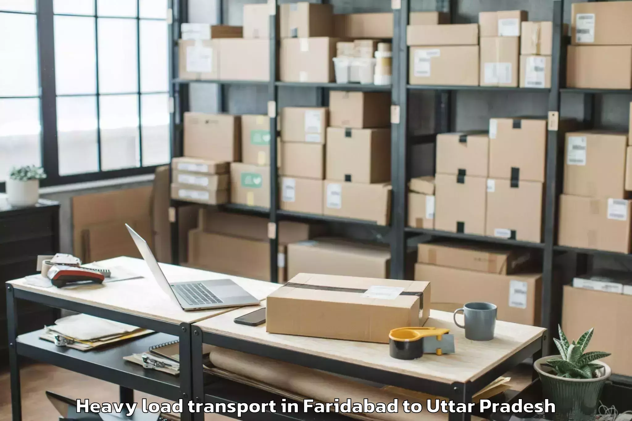 Top Faridabad to Khadda Heavy Load Transport Available